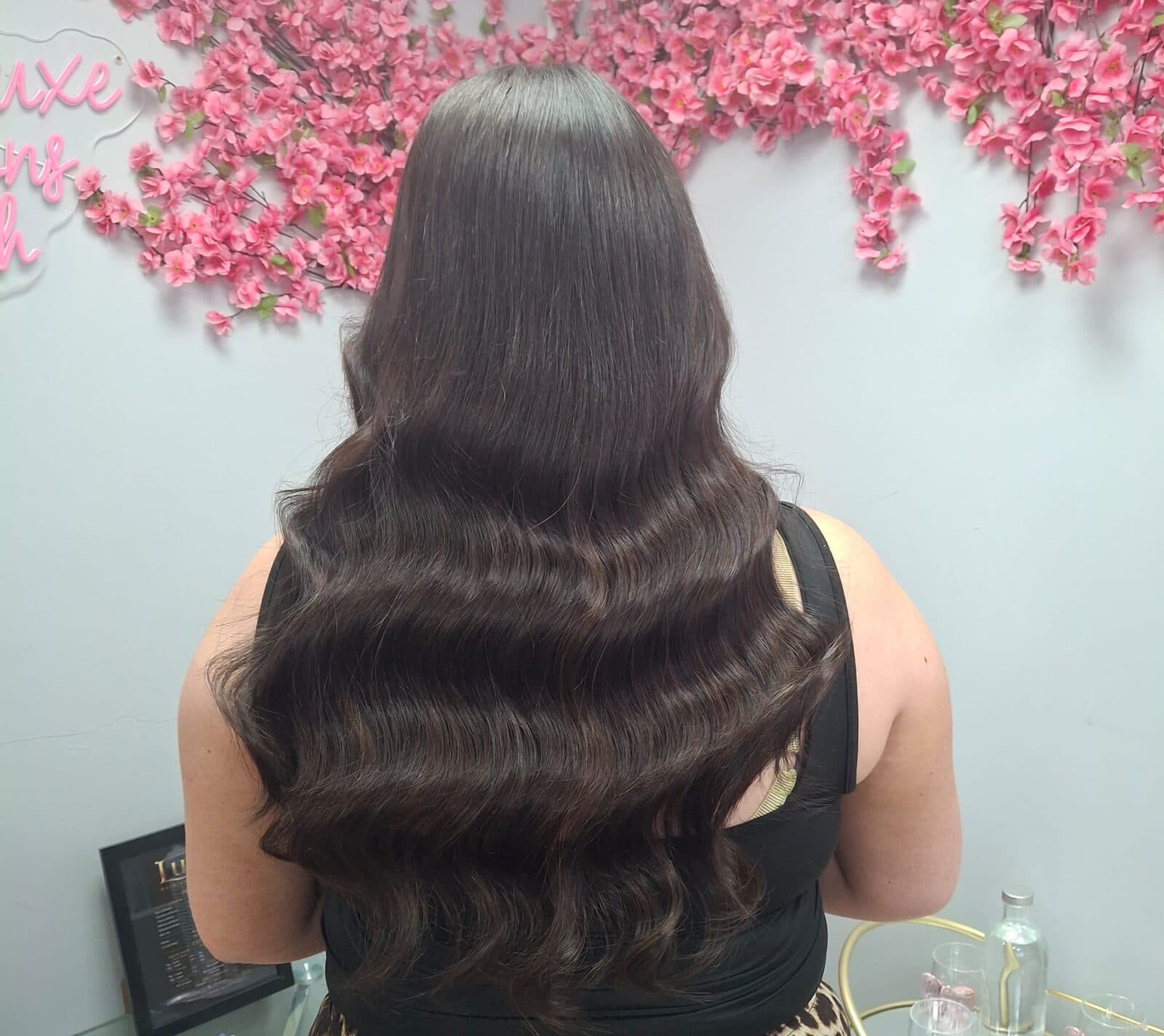 Chocolate brunette hair styled in deep waves