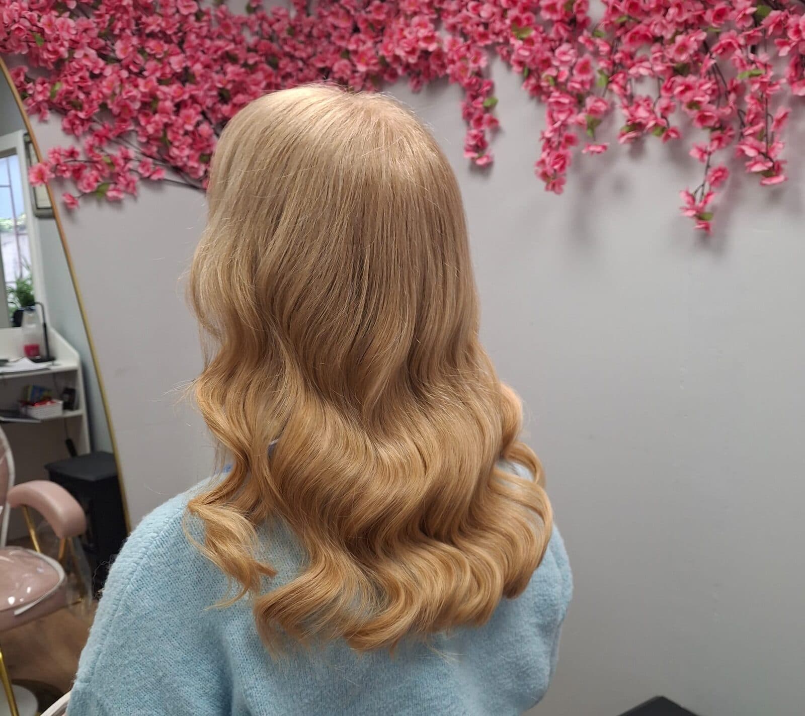 Strawberry copper blonde colour with curled ends