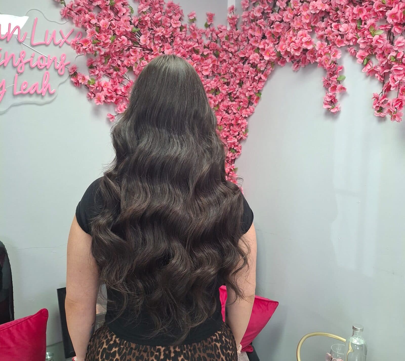 Long dark brunette extensions with glam waves