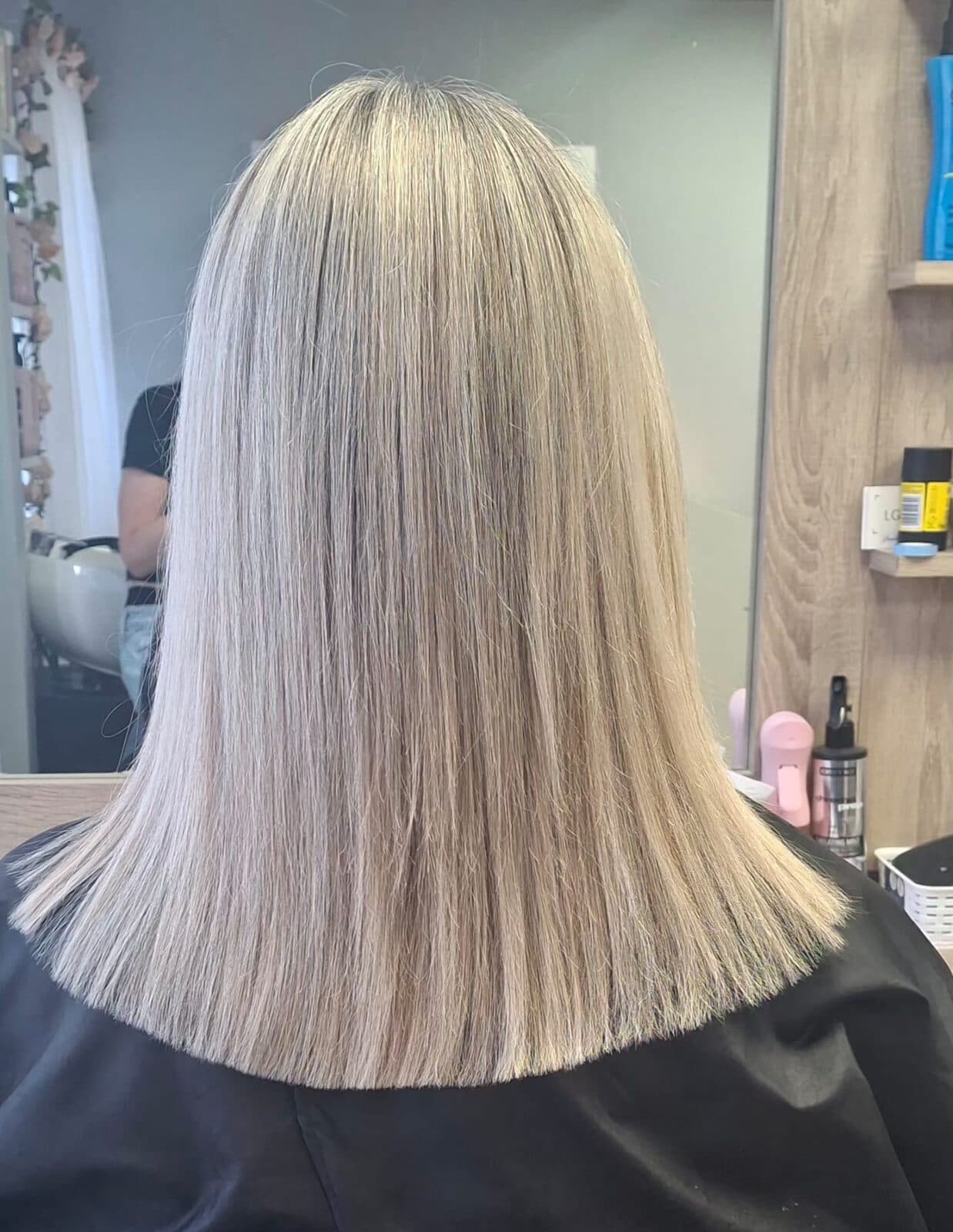 Icy silver blonde colour on straight hair